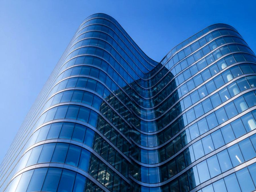 Curved glass skyscraper — AI enhanced high-resolution version